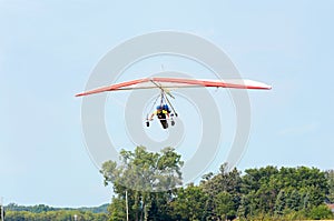 Hang Gliders Flying Above Airstrip